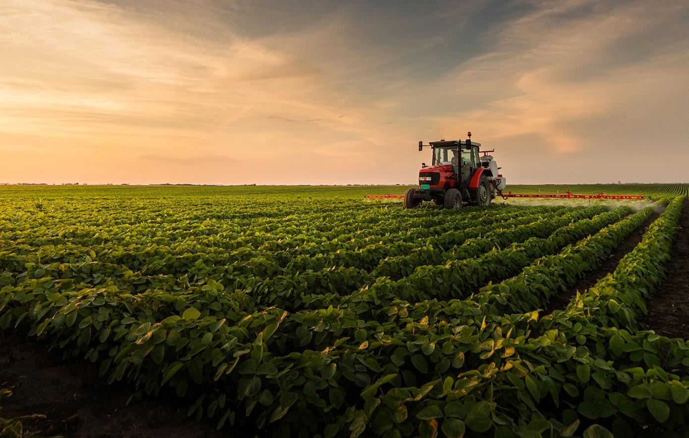 A tractor working on farmland